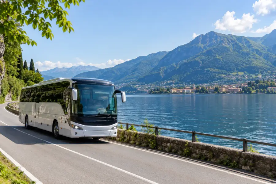 A coach on a lakeside road